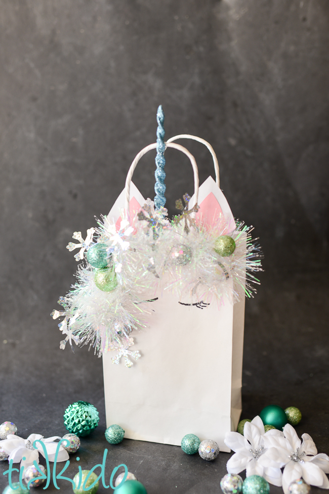 Make Christmas even more magical with this sparkly Christmas unicorn gift bag tutorial.