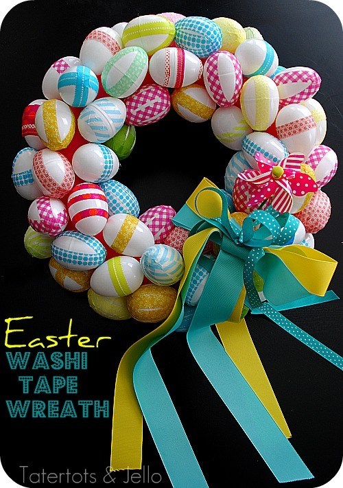Easter wreath made of white plastic eggs embellished with washi tape and ribbon.