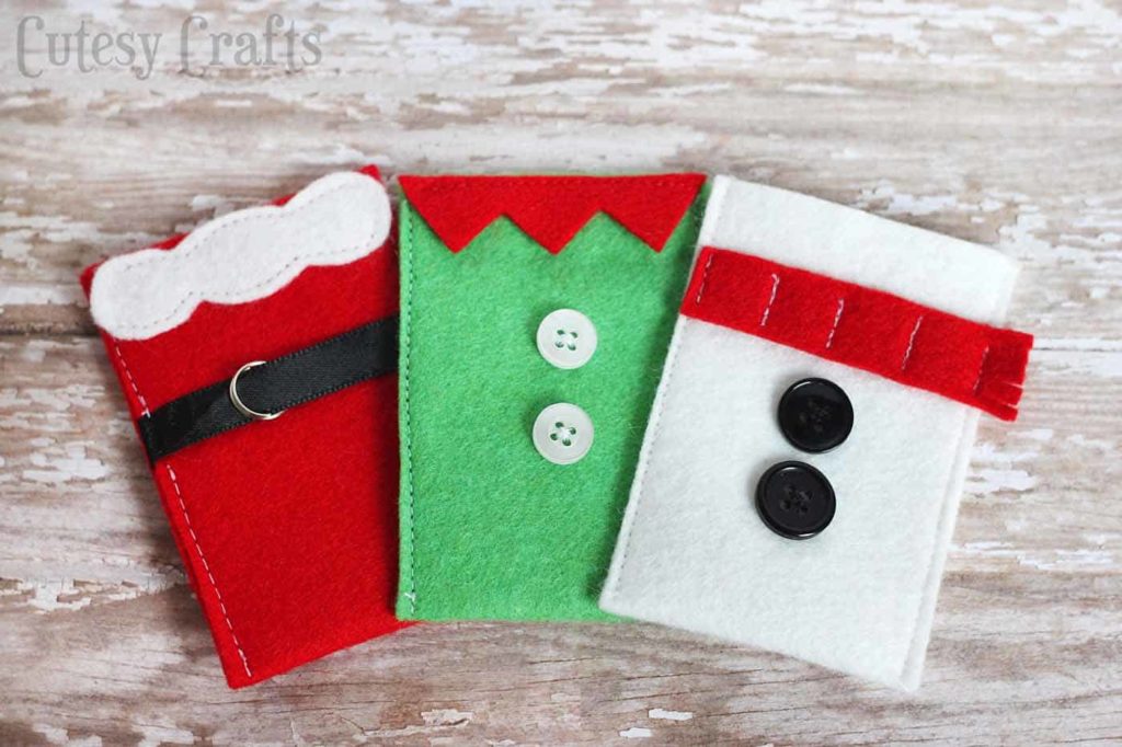 Felt Santa, elf, and snowman gift card holders.